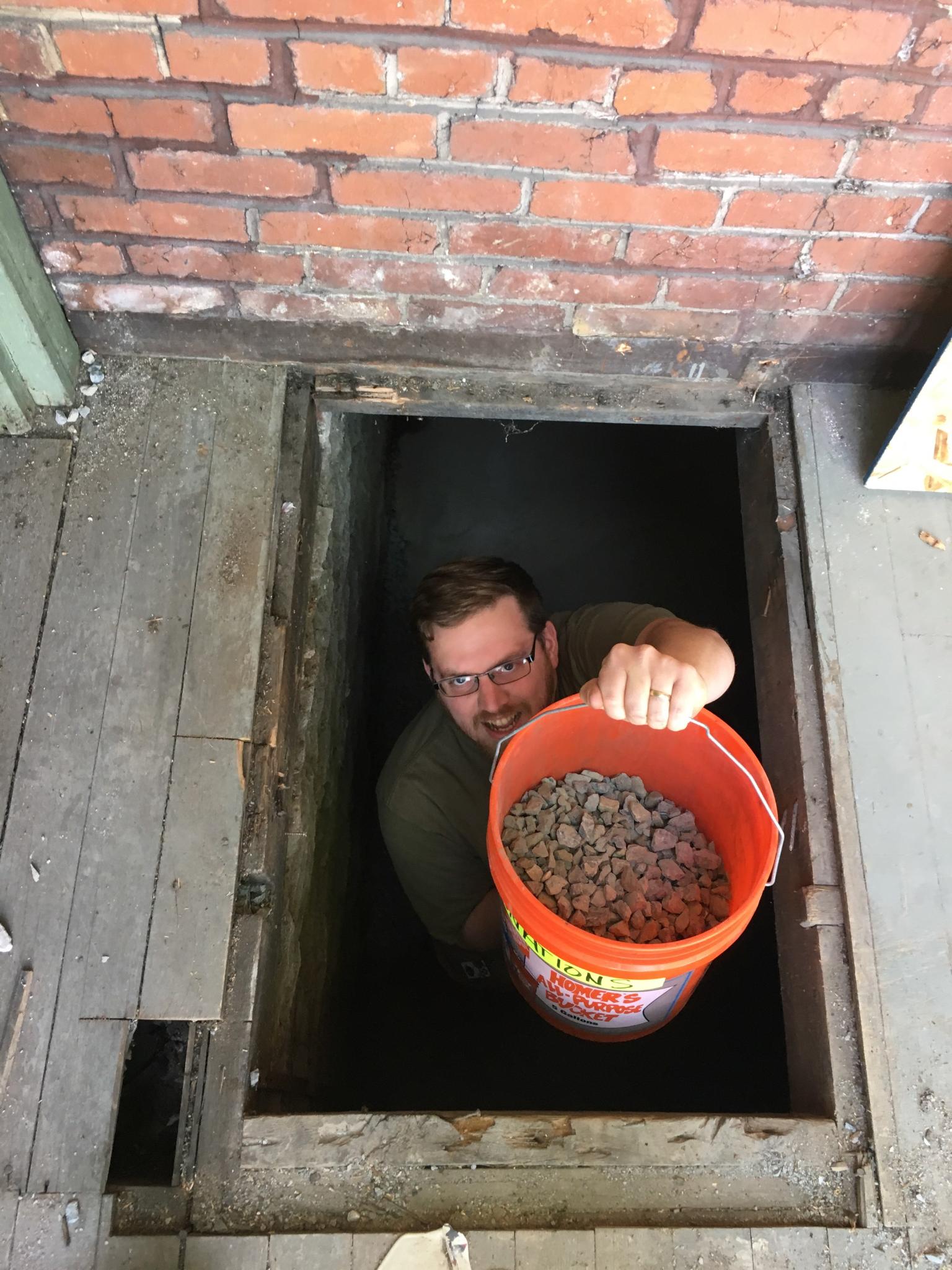 Man in basement hatch